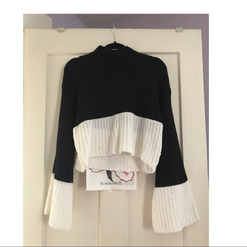 White and black sweater